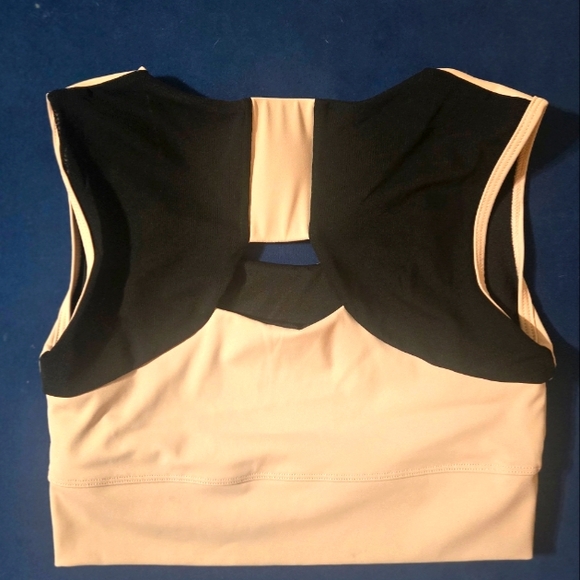 never worn creme & black with cutout in back, revive XL FORME sports bra. - Picture 2 of 3